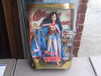 Front view of Barbie Wonder Woman doll in original box showing doll and packaging design.