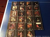 Top view of 23 CD cases laid out in rows, all part of the Time Life Country USA series, showing each yearly edition from 1950 to 1972.