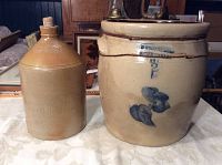 Side by side view of the 2 gallon open mouth merchant crock and the Rigney & Hickey jug.