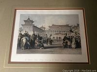 Framed and matted engraved print showing detailed Asian architectural scene with people and horses.