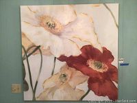Full view of a large painting depicting big white and red flowers on a neutral background, unframed, measuring 44x44 inches approximately.