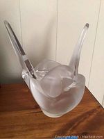 Front quarter view of vase with flower frog in place