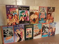 Photo shows 11 Bob Hope VHS movie cases arranged in two rows. Titles visible include Road to Zanzibar, The Princess and the Pirate, The Cat and the Canary, Son of Paleface, Road to Rio, Here Come the Girls, among others.