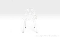 Front view of one white modern geometric chair with polygonal openwork seat and back on white legs.