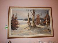 Front view of framed oil on canvas landscape painting signed Julius Varga, showing trees and wintery scene.