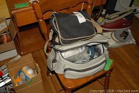 Open bags showing camera accessories and packaging inside