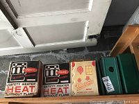 Three boxed Thermix safety heaters with distinctive printing and logos highlighting safety and no carbon monoxide.