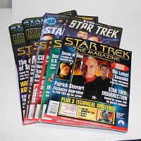Seven Star Trek The Magazine issues with covers featuring Patrick Stewart and other characters.
