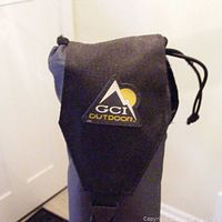 Close-up front view of carrying sleeve with GCI Outdoors logo showing drawstring at top