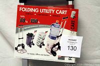 Photo showing the packaging that highlights the cart's features, including weight capacity of 150 lbs, and usage for home, office, and garden.