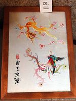 Full front view of framed embroidered silk artwork showing the dragon and phoenix design