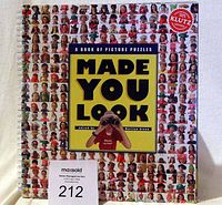 Front cover of the spiral-bound Made You Look book by Klutz, showing a collage of faces and the title in yellow and black.