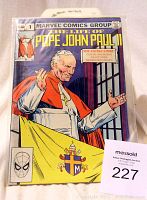 Front cover of The Life of Pope John Paul II comic book from Marvel, Issue #1. The cover shows an illustrated image of Pope John Paul II with the title at the top and Marvel Comics Group label.