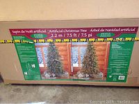 Box with product images and details for 7.5 ft fully lighted artificial Christmas tree