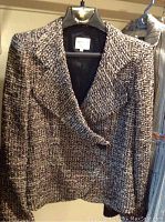Front view of patterned multi-tone Armani jacket on hanger