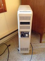 Front view showing the control panel and power switch on the heater's end.