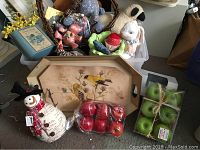 Farmhouse decoration lot with various cloth, ceramic, and wooden animal figures, easter bunny planter, heart hanging, wood apples, and a floral bird tray.