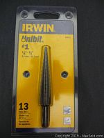Front view showing the Irwin Unibit #1 step drill bit in original plastic and cardboard packaging with yellow background.