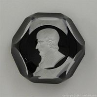 Top view showing faceted clear crystal with detailed etched profile of Napoleon Bonaparte.