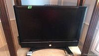 Viewsonic 27 inch TV front view showing screen and stand.