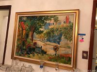Framed oil painting depicting a garden path, house, trees, and flowers in impressionistic style.