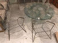 Front view of two diamond wire chairs side by side