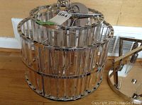 Closer side view showing height and vertical chrome rods.