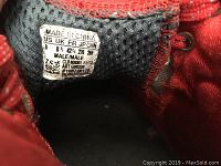 Inner label showing size US 9, made in China, male size with detailed size conversions.