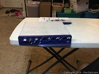 Top side view of Digidesign MBox2 Pro audio interface mixer showing control knobs and input ports on the front panel.