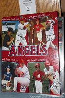 Front cover of the red Anaheim Angels binder showing images of Casey Kotchman, Scot Shields, John Lackey, Howie Kendrick with Angels logo