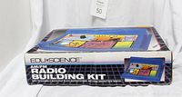 Box of Edu-Science AM/FM Radio Building Kit showing graphics and branding.