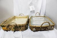 Photo of two rectangular Pyrex glass baking dishes placed inside decorative wicker baskets with rope handles.