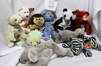 Photo showing ten assorted Beanie Babies including teddy bears, monkey, panda, rhino, zebra and more in various colors and some with Ty tags