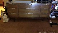 Front view of full dresser showing all drawers and hardware