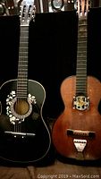 Both guitars side by side showing overall body and neck details.