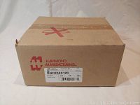 Closed cardboard box with Hammond Manufacturing logo and printed label.