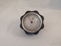 Front view of Siko pressure gauge showing dial with needle indicator and numerical scale.