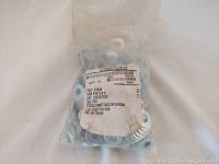 Photo of first bag of Fastenal steel flat washers, USS FW 3/8 size, zinc plated, quantity 500