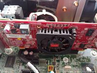 Close-up of red graphics card with fan inside HP EliteDesk 800 G1 case