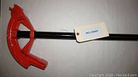 Red head and black handle foot pipe bender for 1 inch EMT and 3/4 inch rigid pipe, SKU 000487
