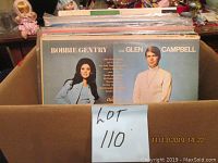 Box with Bobbie Gentry and Glen Campbell album visible on top
