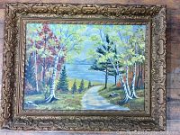 Full view of oil painting in ornate antique frame depicting a landscape scene with birch trees, pine trees, a winding path, water body, and hills.