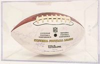 NFL Wilson football with Denver Broncos player signatures on white panel, displayed in clear protective case.
