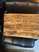 Top view of wooden crate showing Canadian Industries Limited, shotgun shells text.