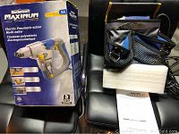 Photo showing the Mastercraft Maximum electric pneumatic multi nailer with accessories, tool bag, power cord, manual, and original product box.