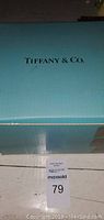 Tiffany & Co. blue box with brand logo on top