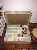 Opened original box showing five rows of 1988 Donruss baseball cards with several puzzle cards visible.