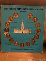 Card showing 16 round medallions around the image of the Parliament building with names and dates of Canadian Prime Ministers 1867-1969