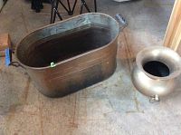 Photo showing the copper tub and brass spittoon on concrete floor, clearly showing sizes and overall condition