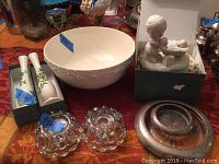 Full lot with Lenox vases in box, Wedgwood bowl, glass candlesticks, metal drip plates, and Precious Moments music box
